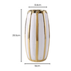 Vase doré et blanc
